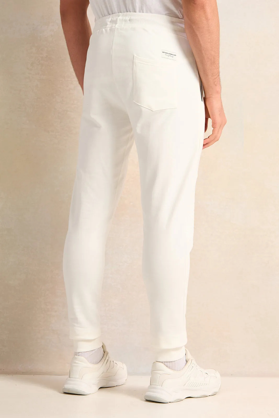 Men Ivory Solid Active Pants